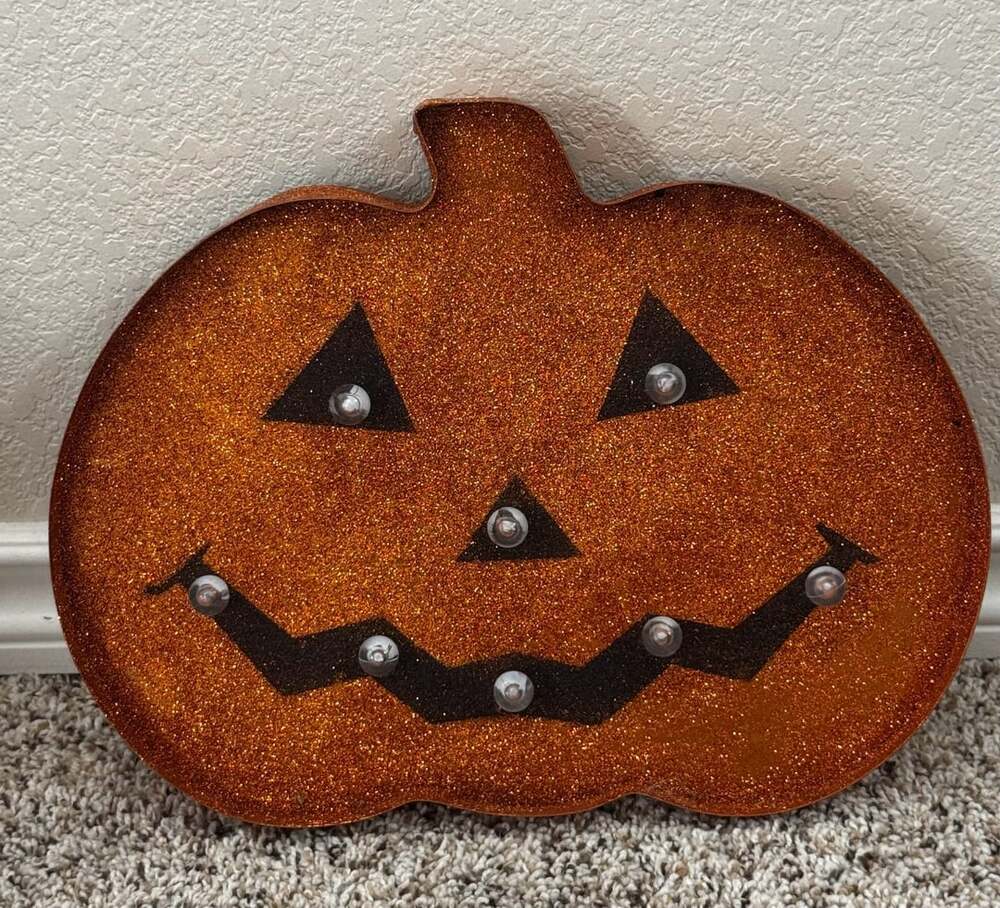 Metal-framed Orange Glitter, Color Changing LightUp Jack O’Lantern Marquee Sign